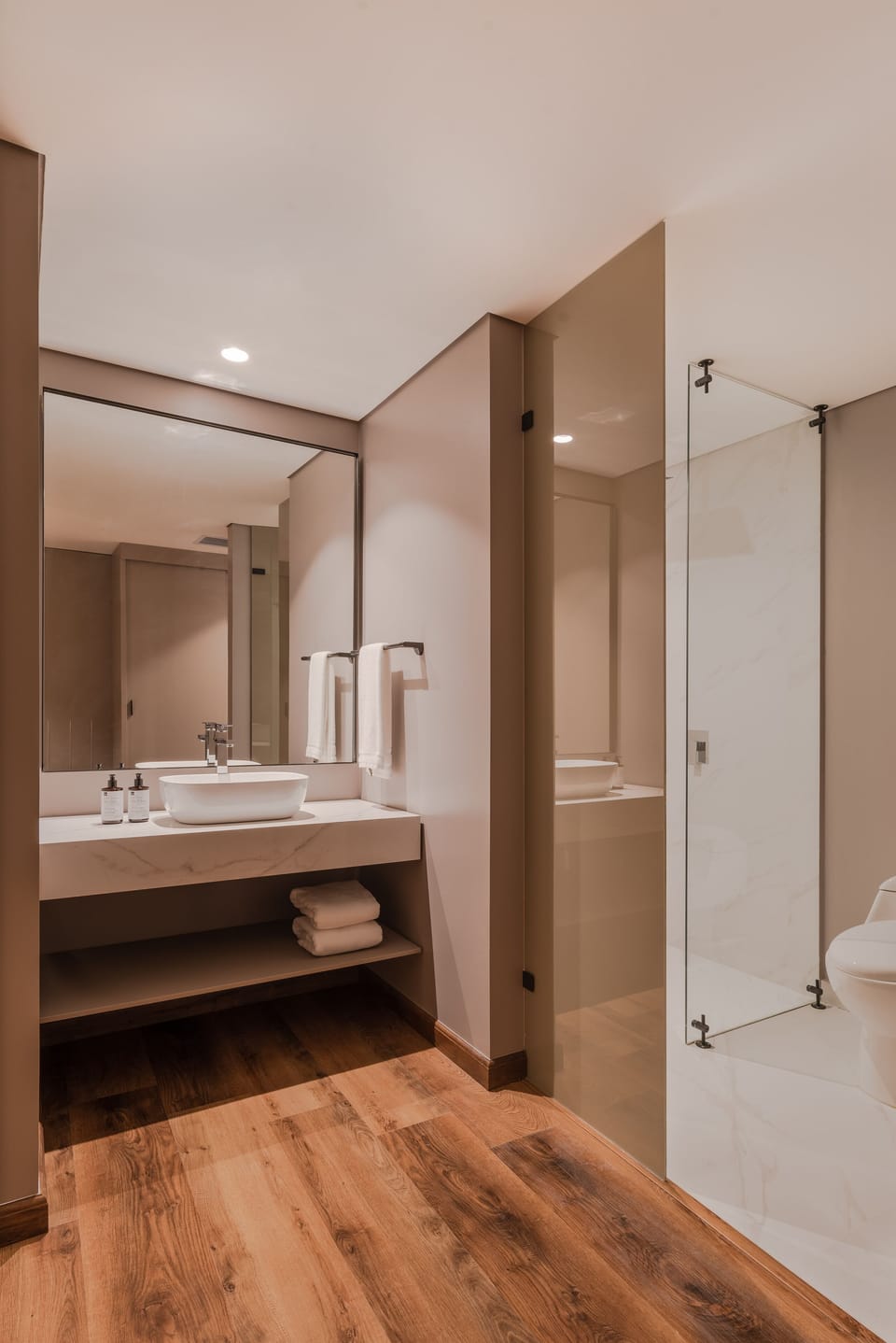 Shower, rainfall showerhead, hair dryer, towels