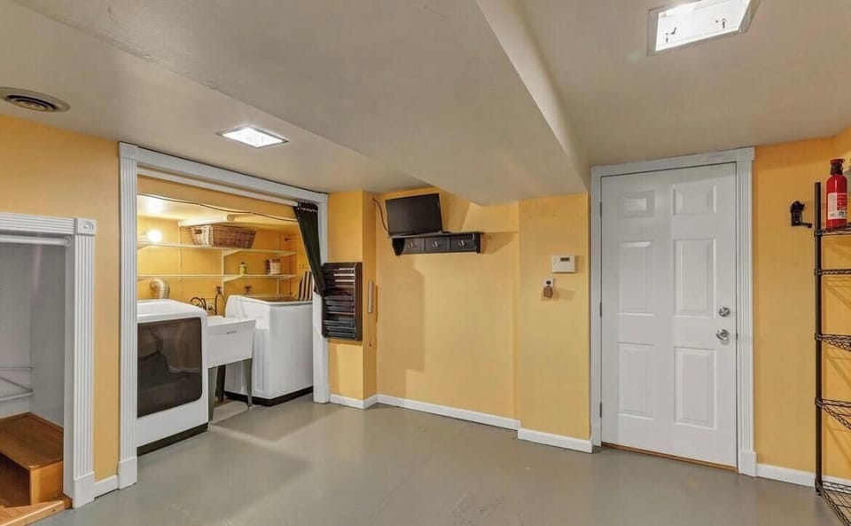 Large laundry room space with new, large washer/dryers! 