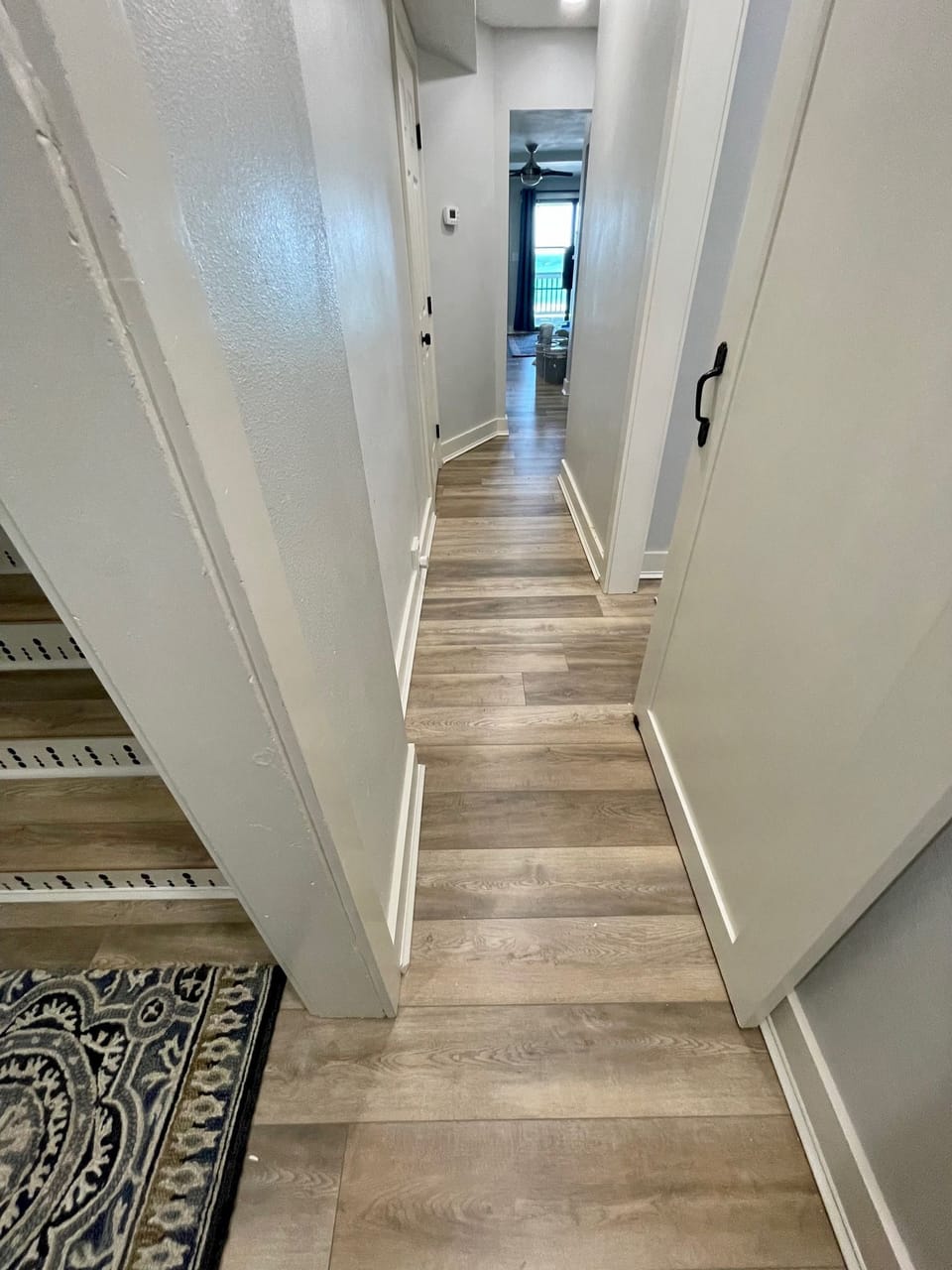 1st Floor Hallway to Mini Master, Laundry Room, Wet Bar and Bunk Room