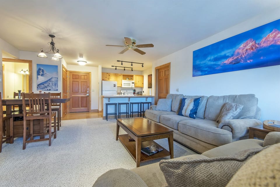 Living, Dining and Kitchen featuring magnificent photography and cozy furniture