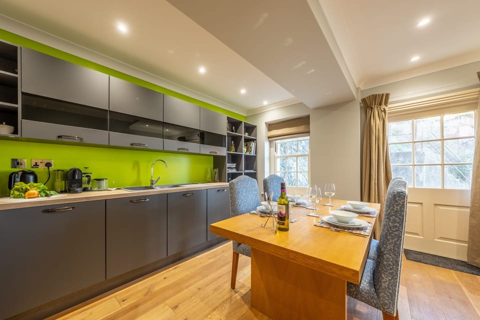 Ground floor: A door to the side of the kitchen offers further sea views