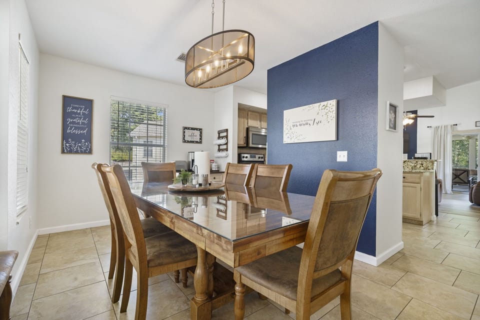 Dining Room seats 8 adults comfortably. 6 chairs plus a bench. 4 stools at bar.