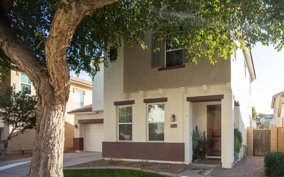 view from the right showing front door and partial garage