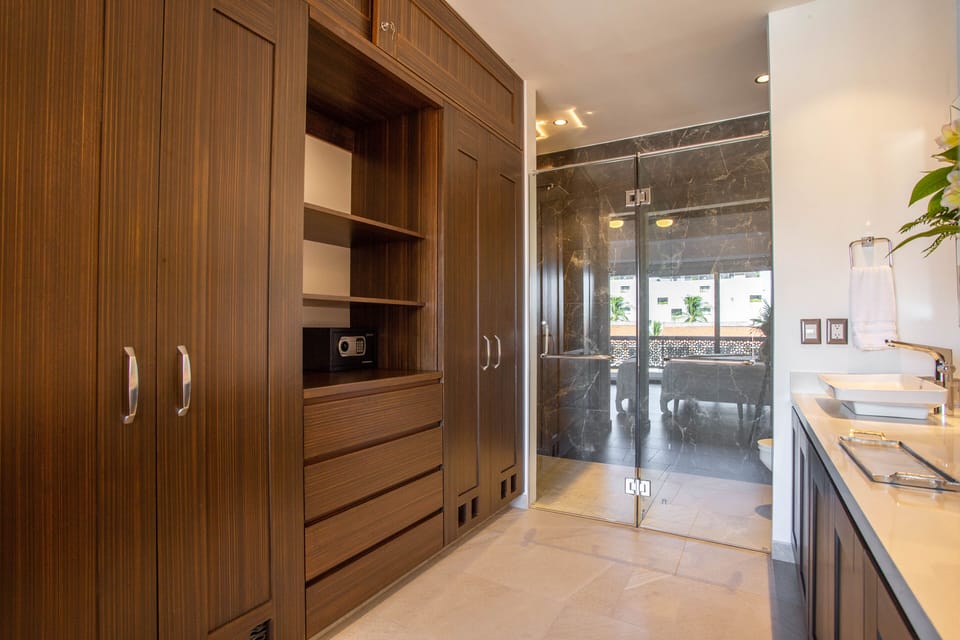 The bathroom has a huge closet space and it's fully stocked