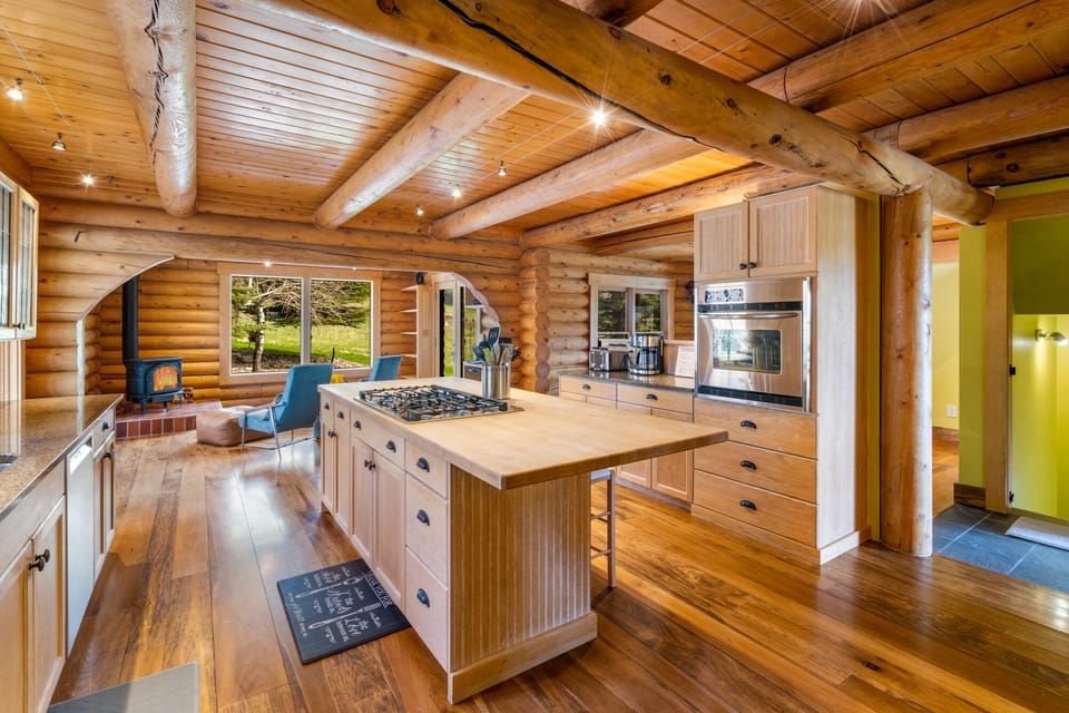 Full kitchen with drip coffee maker.