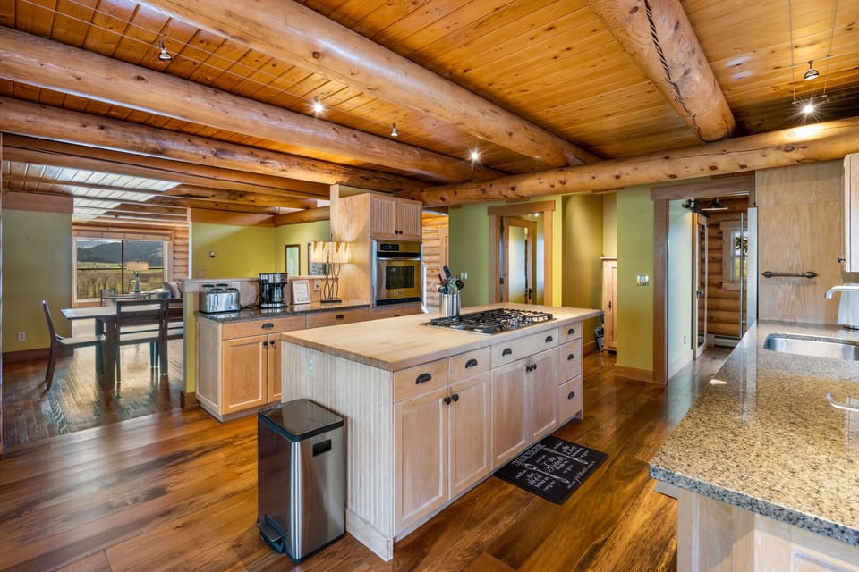 Full kitchen with drip coffee maker.