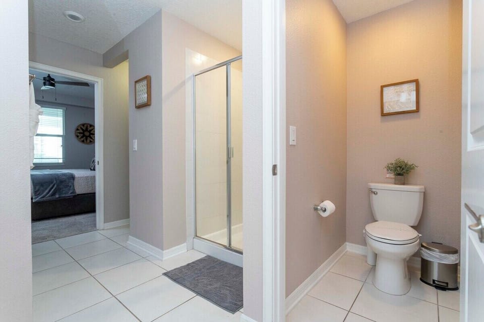 Unwind in the clean, elegant and comfortable master  bathroom