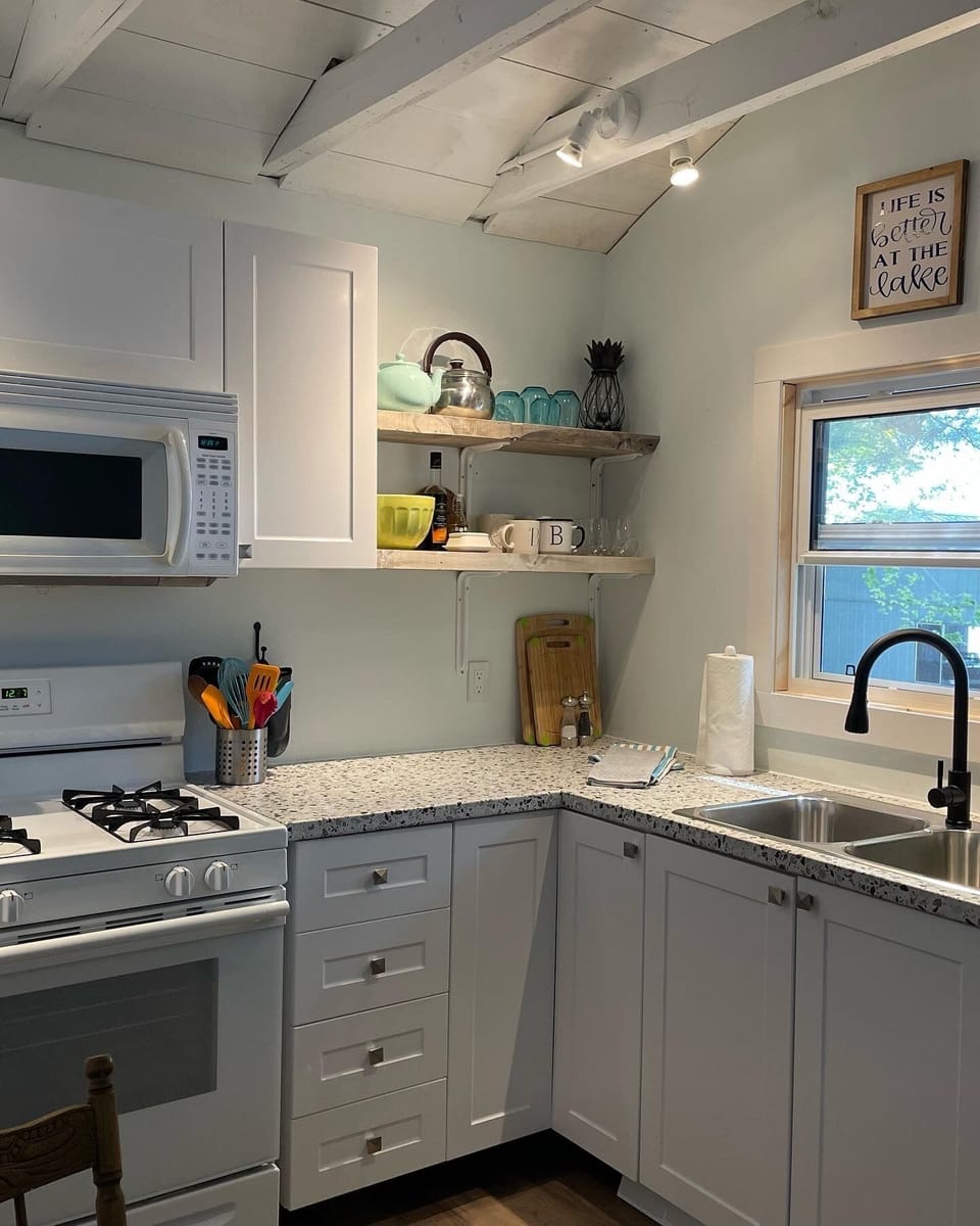 Well appointed kitchen with gas stove, microwave, coffee maker & toaster