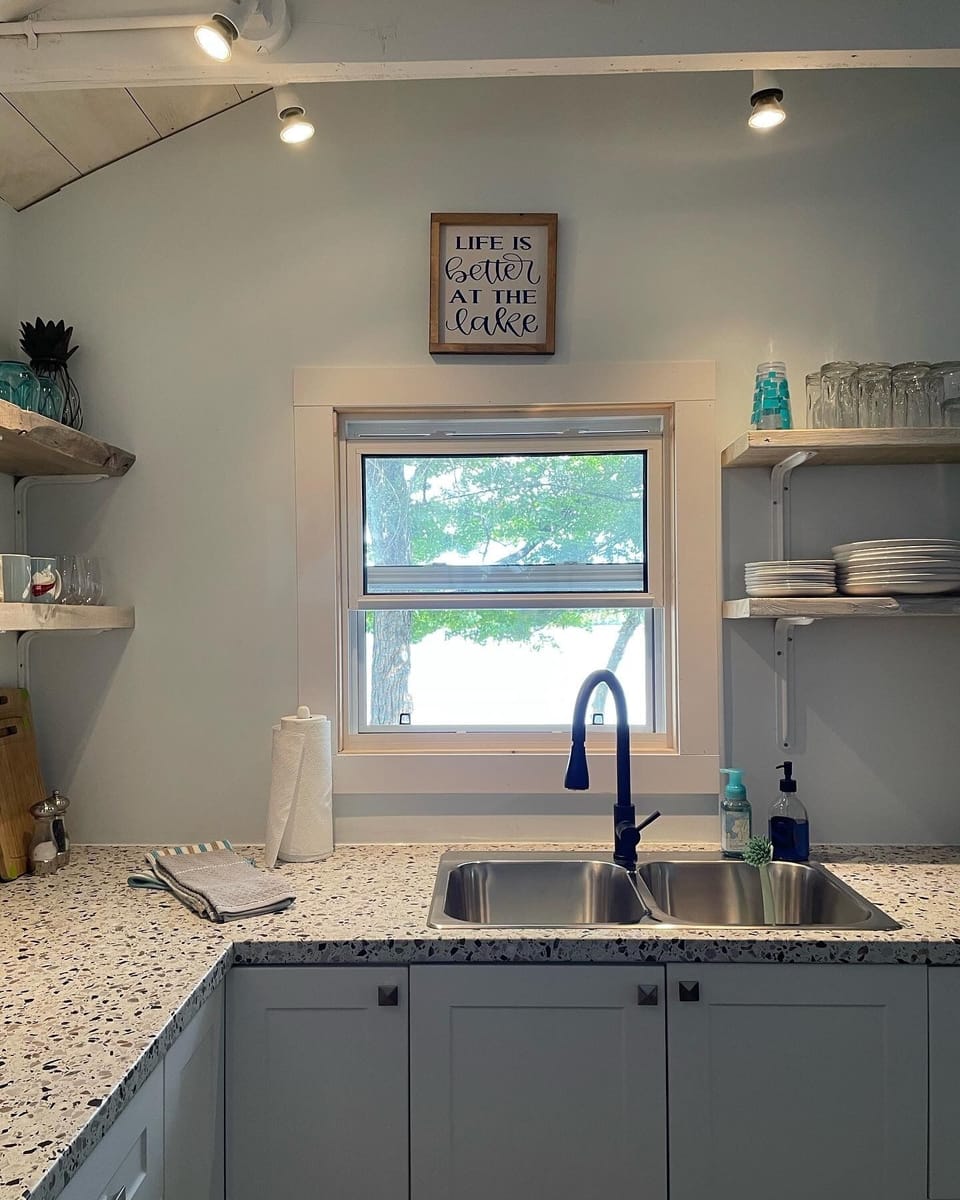 View from the kitchen sink out to the lake and your dock