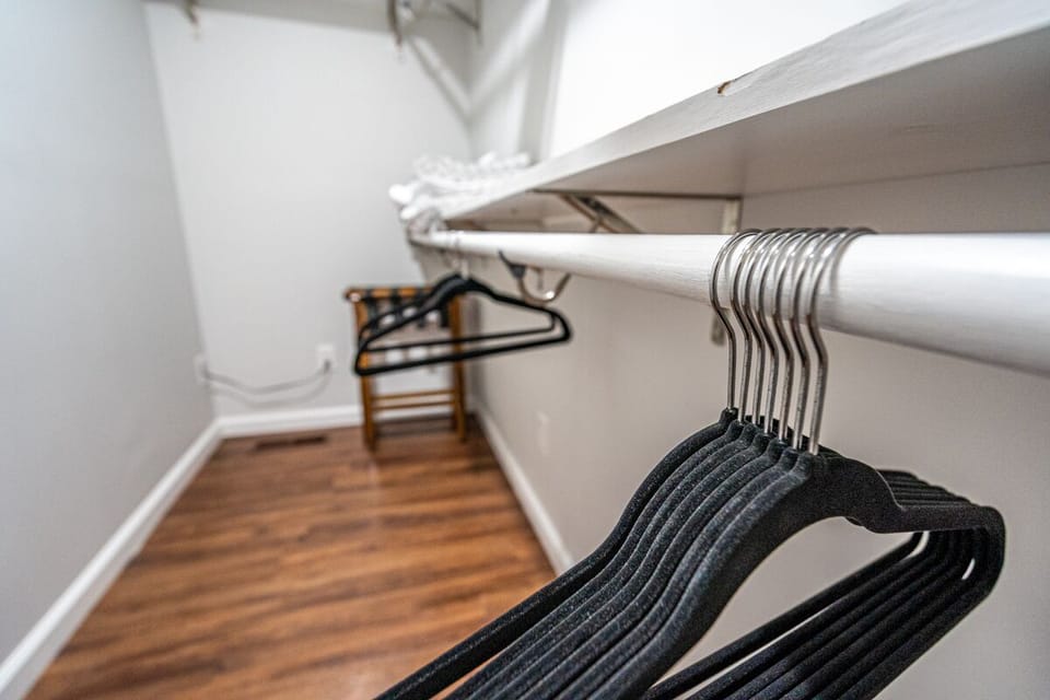 Walk in master closet, luggage racks and plenty of hangers
