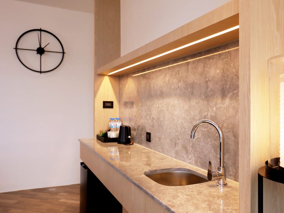Premium Suite, 1 Bedroom | Living area | 40-inch flat-screen TV with digital channels, TV