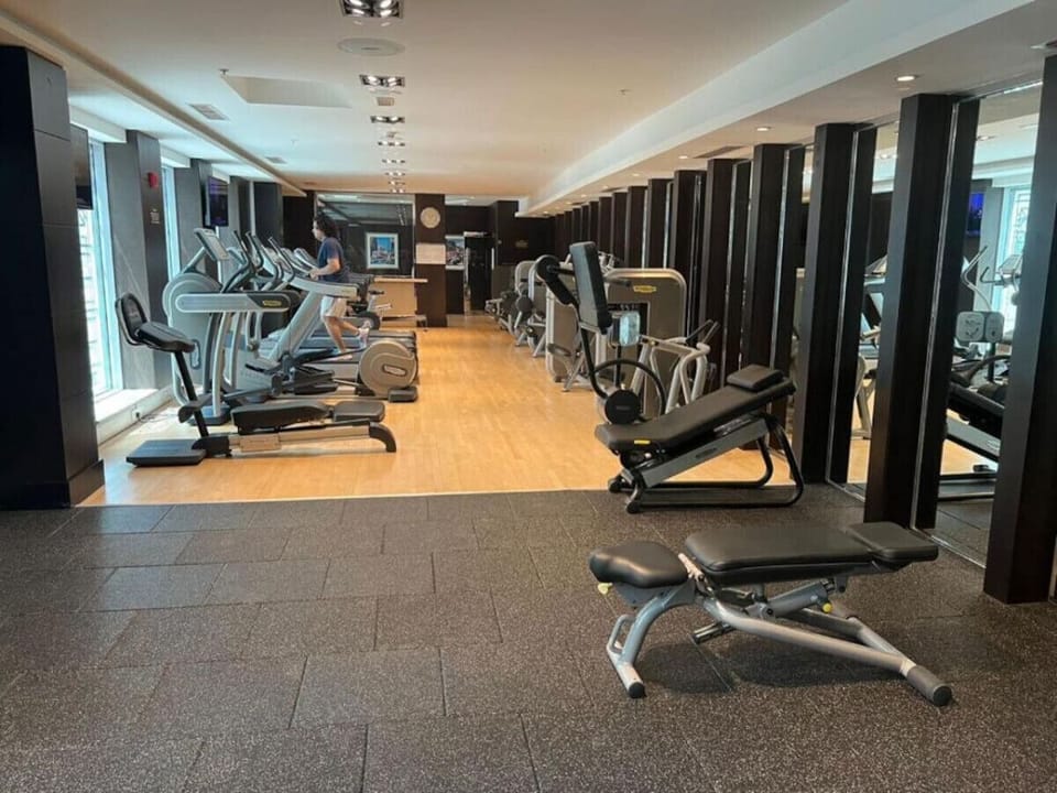 Fitness Center: Energize your stay with state-of-the-art equipment and radiant city views!