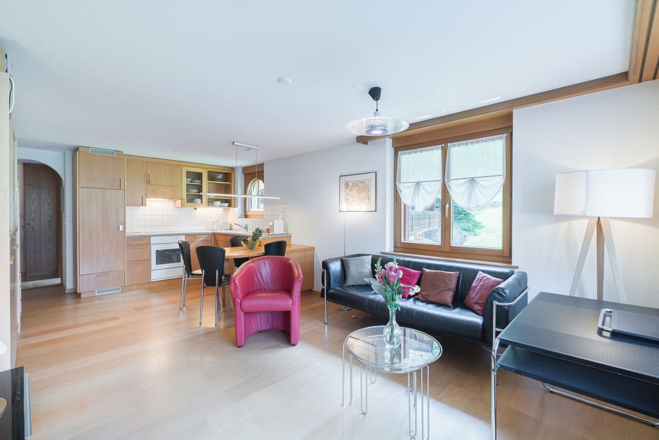 One-Bedroom Apartment with Matterhorn View | Living area | Heated floors, offices