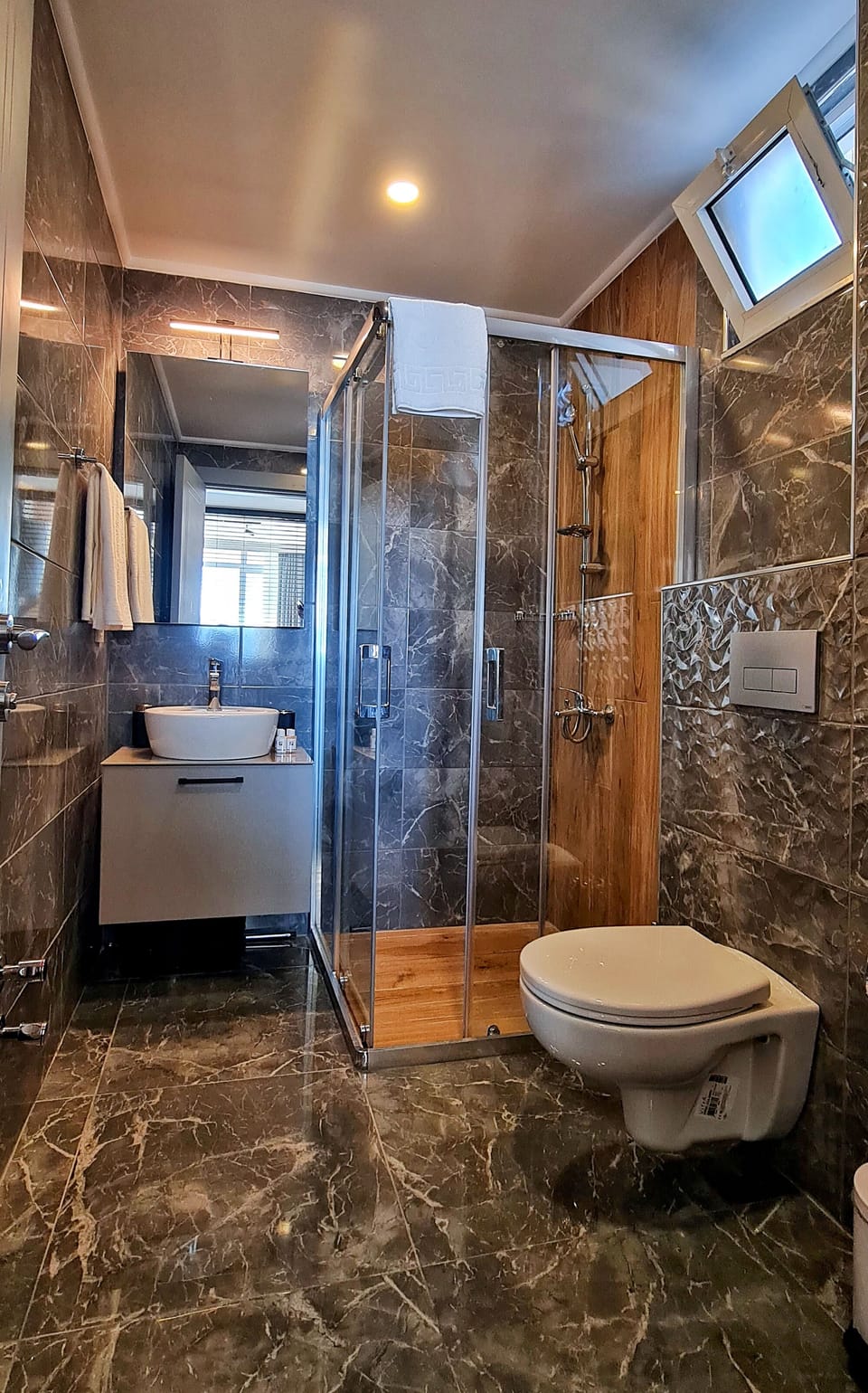 Suite, Sea View | Bathroom | Shower, slippers, towels