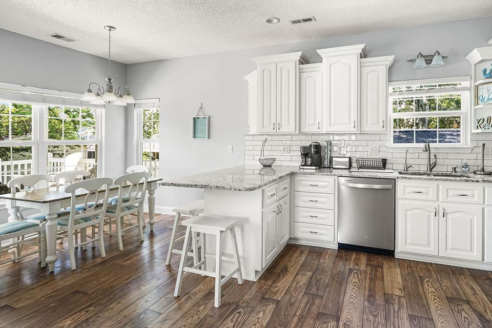 Bright, airy kitchen with spacious dining and modern amenities