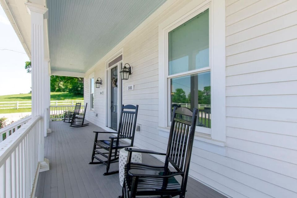 Rocking chairs on the white wrap-around porch invite you to slow down and enjoy the Franklin air.