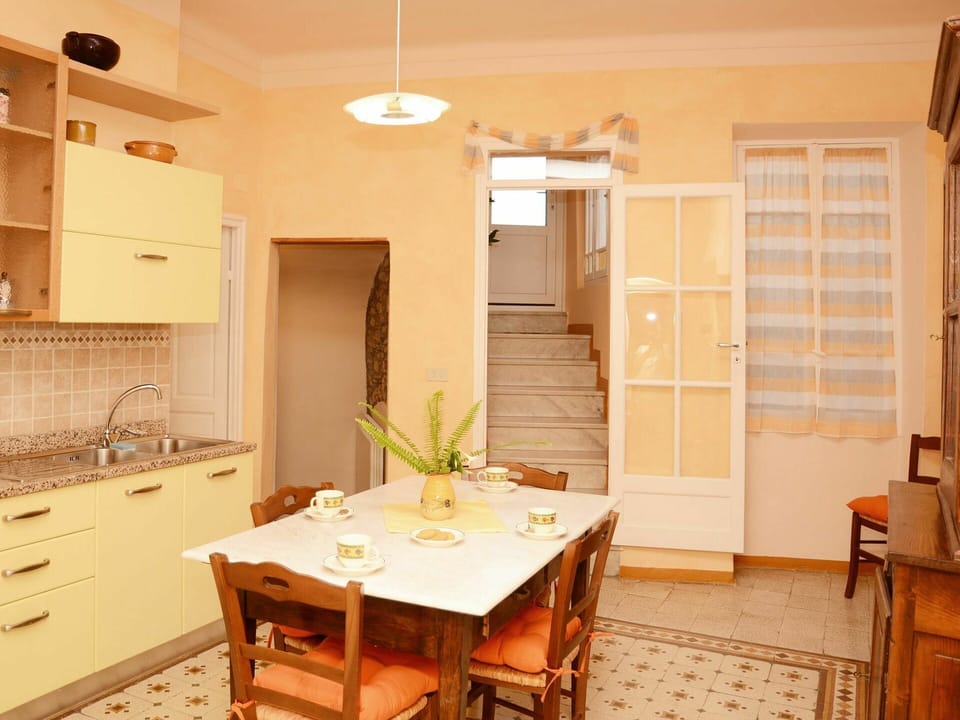 Table, Furniture, Property, Cabinetry, Sink, Chair, Wood, Building, Interior Design, Lighting