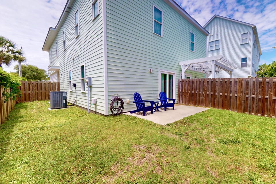 The fenced in yard is perfect for bringing your furry family members