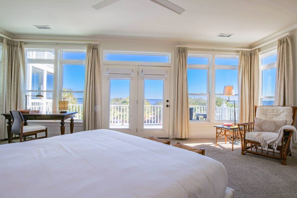 The Sea Sponge primary suite boasts spectacular ocean views and lovely natural light.