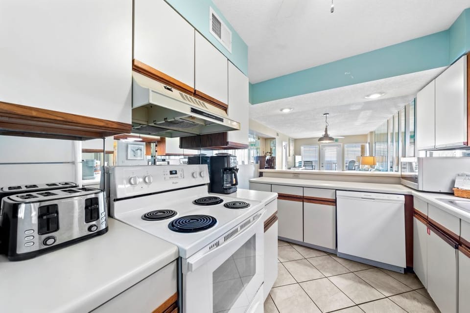 Your fully equipped kitchen awaits with modern appliances, ample counter space, and everything you need to prepare memorable meals during your stay.