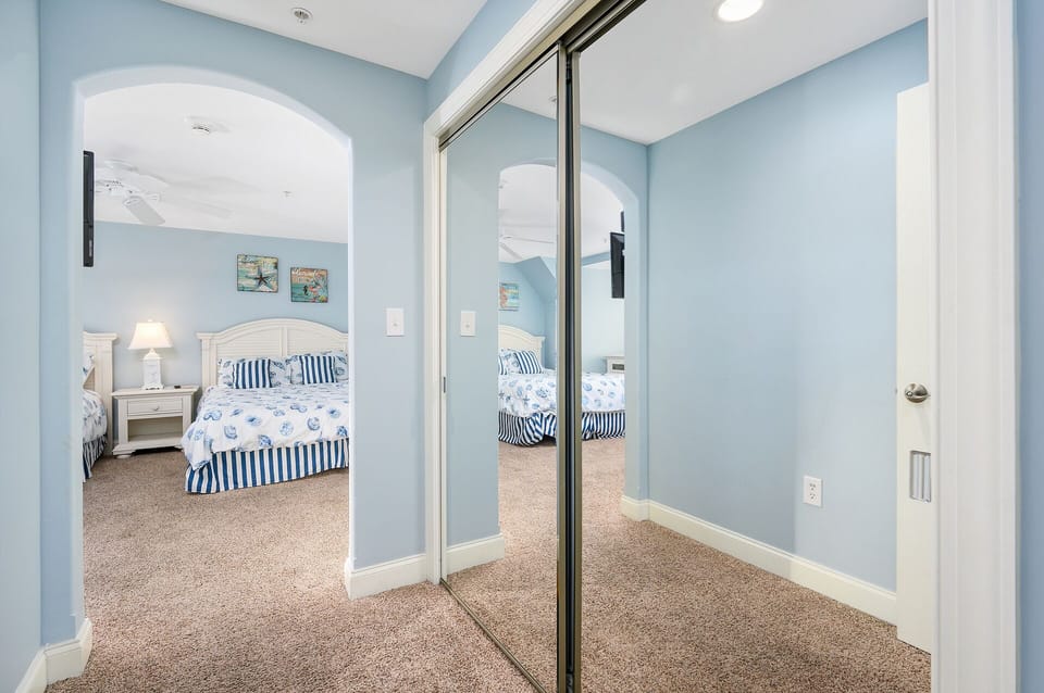 Large Mirrored doors just add to the Brightness of this beautiful room