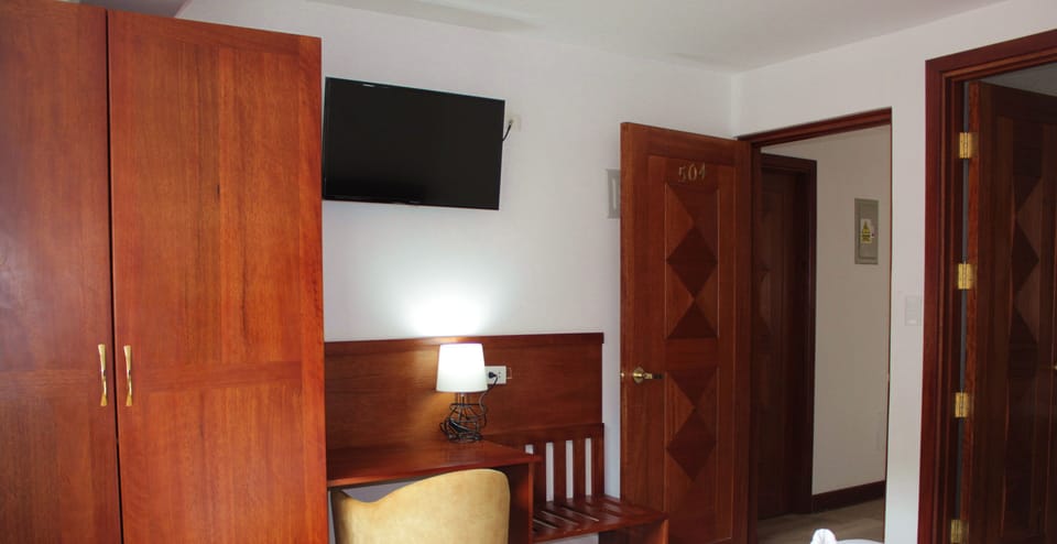Desk, laptop workspace, WiFi (free), bed sheets