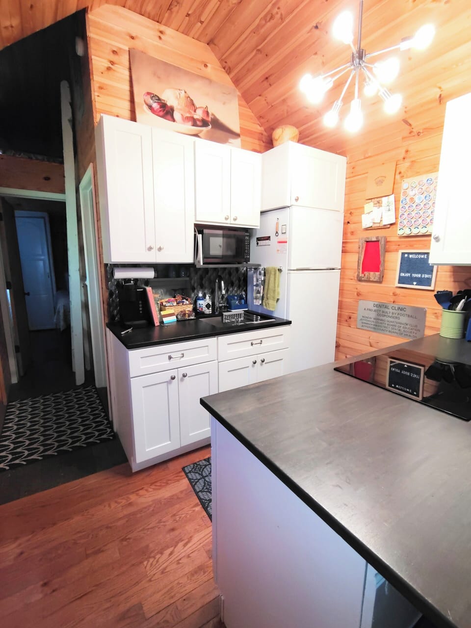 microwave, large stainless sink, granite counter, Keurig, refrigerator