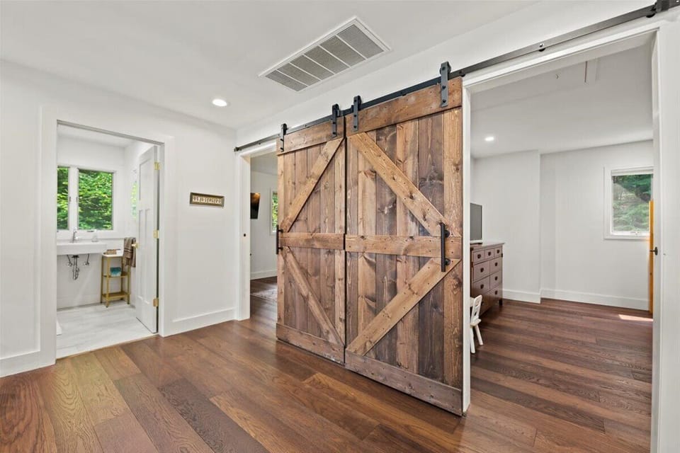Upstairs landing with an office desk - overlooking the woods and the lake