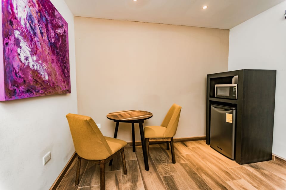 Standard Suite | Living area | 40-inch Smart TV with digital channels, TV, heated floors