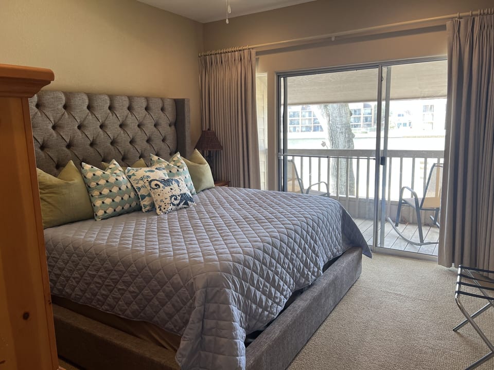 2nd floor Waterfront master suite with King bed and private full bath & balcony.