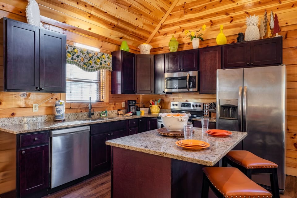 Full kitchen with granite island — built for group meals