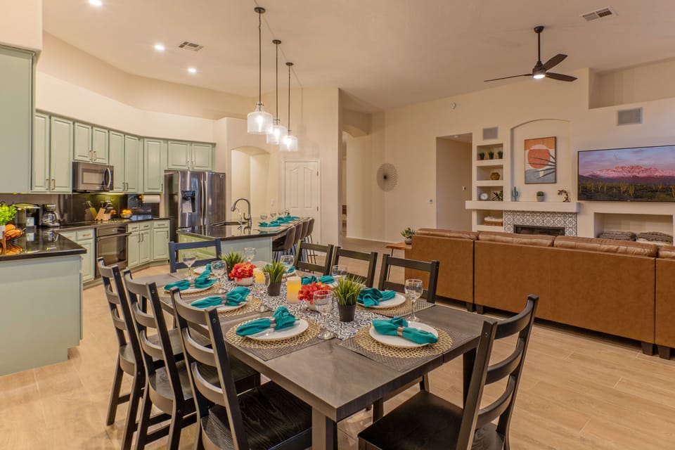 Enjoy casual or more formal meals at the dining area table.