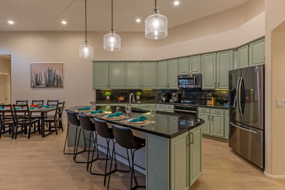 The well stocked kitchen has counter space to prep and serve healthy, home-cooked meals.