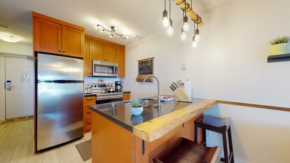 Cook like a local in the fully equipped kitchen with sleek stainless steel appliances.
