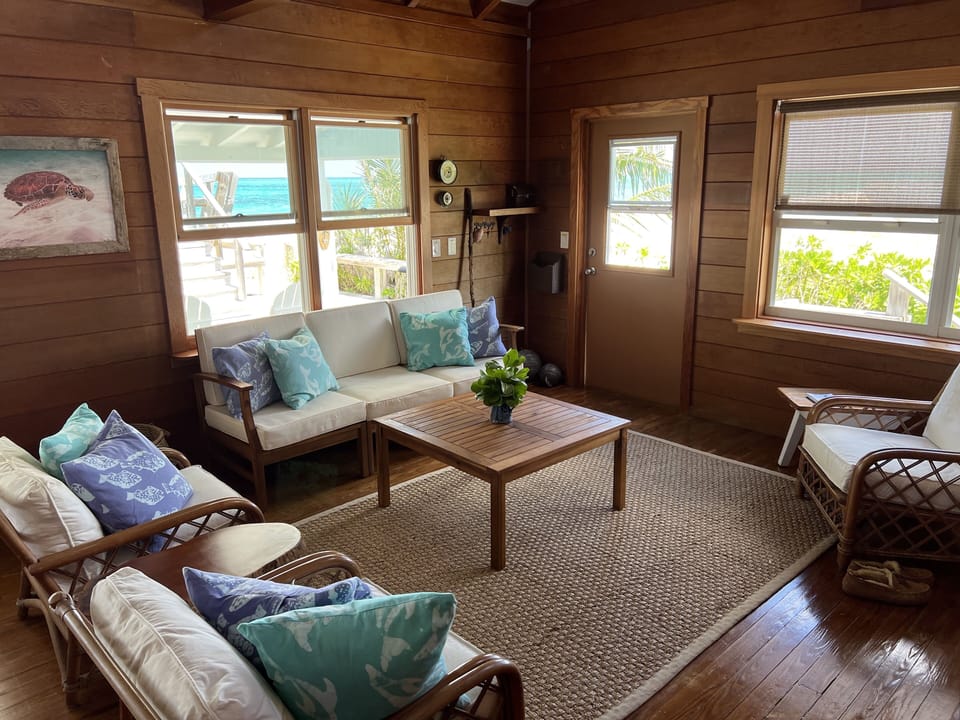 Sea Biscuit's family room with views of the turquoise sea. 