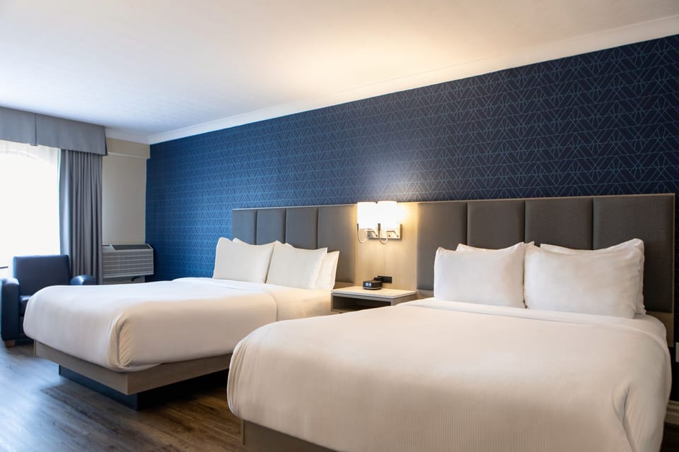 Deluxe Room, 2 Queen Beds | Premium bedding, down comforters, pillowtop beds, individually decorated