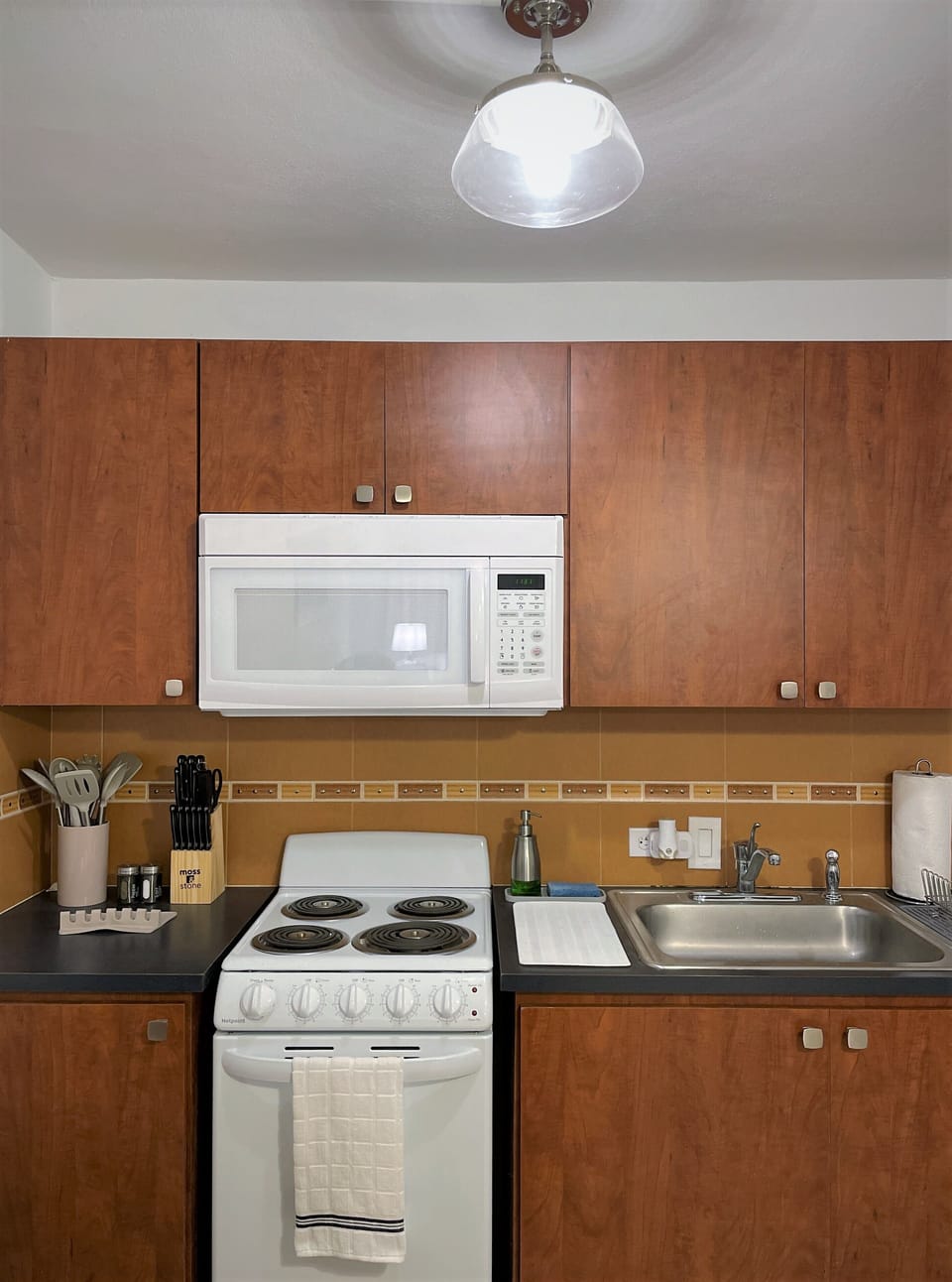 The kitchen contains brand new appliances and is fully equipped.