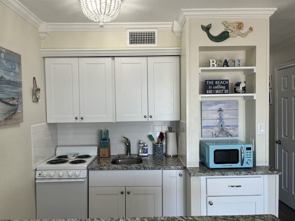 We provide dishes, cooking utensils, mixing bowls, pots/pans, and baking sheets.
