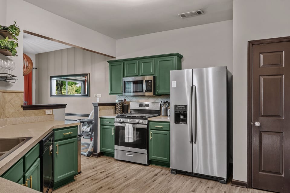 Make meal prep easy in the fully equipped kitchen with modern appliances, plenty of counter space, and everything you need for your group
