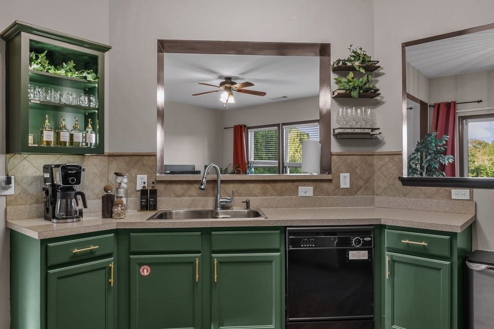 Enjoy a modern kitchen complete with a built-in coffee station, ideal for morning coffee and preparing simple meals at home.