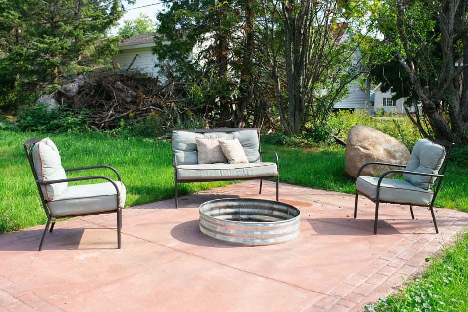 shared back patio with fire pit 