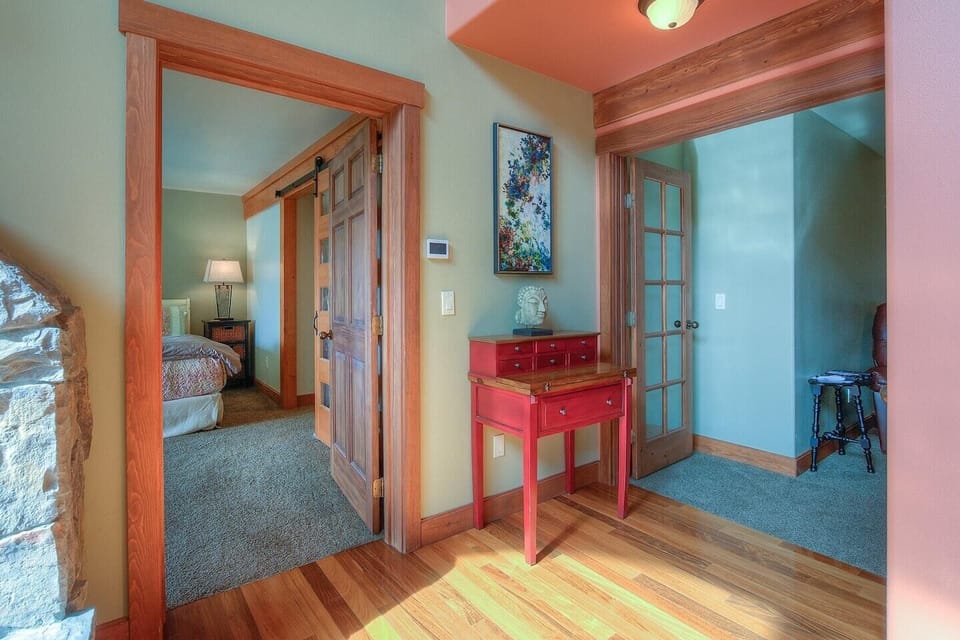 Master bedroom is located on the main floor with the theater room off to the side.