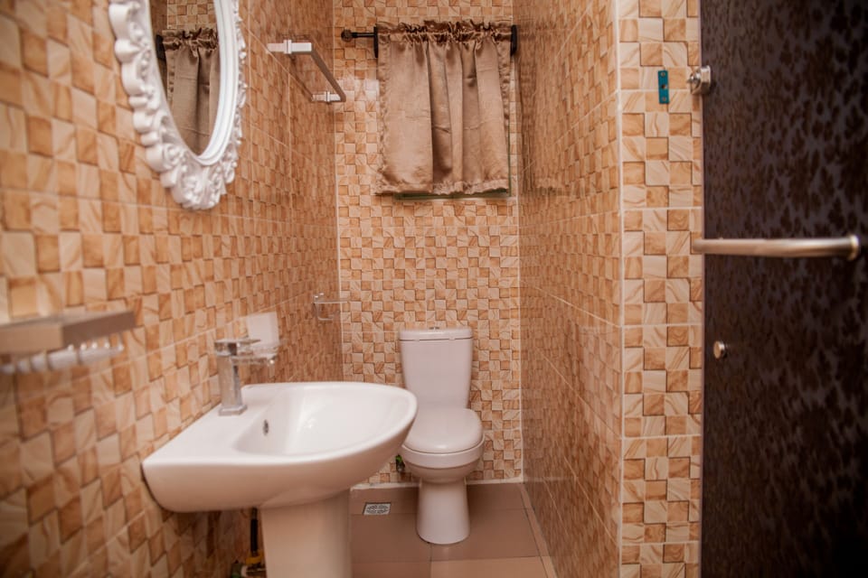 Superior Room | Bathroom | Free toiletries, slippers, towels, soap