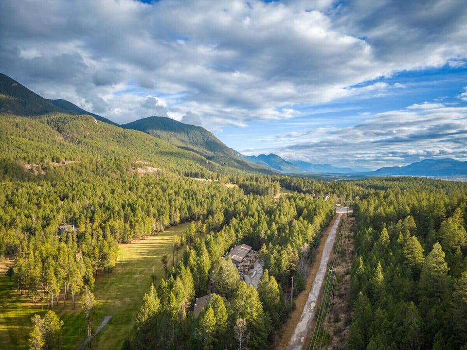 The property is located just outside of downtown Radium, backing onto Radium Golf Course.