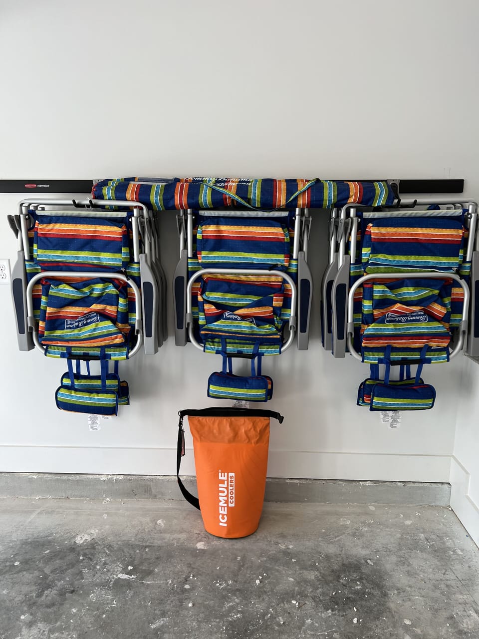 (8) CHAIRS , (2) UMBRELLAS, (1) COOLER