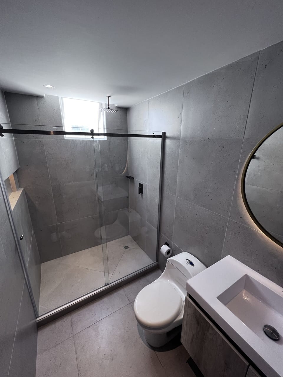 Shower, rainfall showerhead, towels, soap