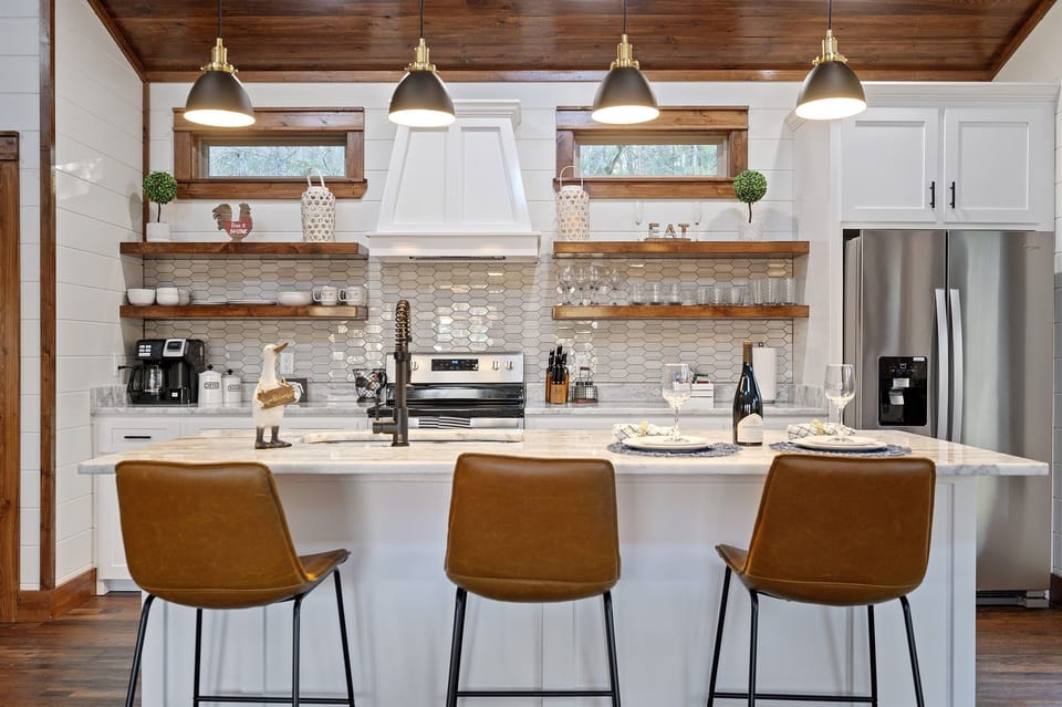 Kitchen Oasis: Enjoy gourmet meals in this stylish kitchen with modern finishes and inviting vibes!