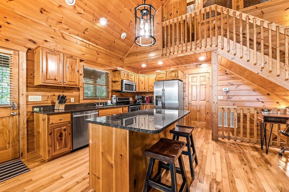 Fully Stocked Kitchen with plenty of counter space, including a large island.  Starter paper towel, dish soap, dishwasher pods are provided. Please bring your own coffee, filters and cream/sug