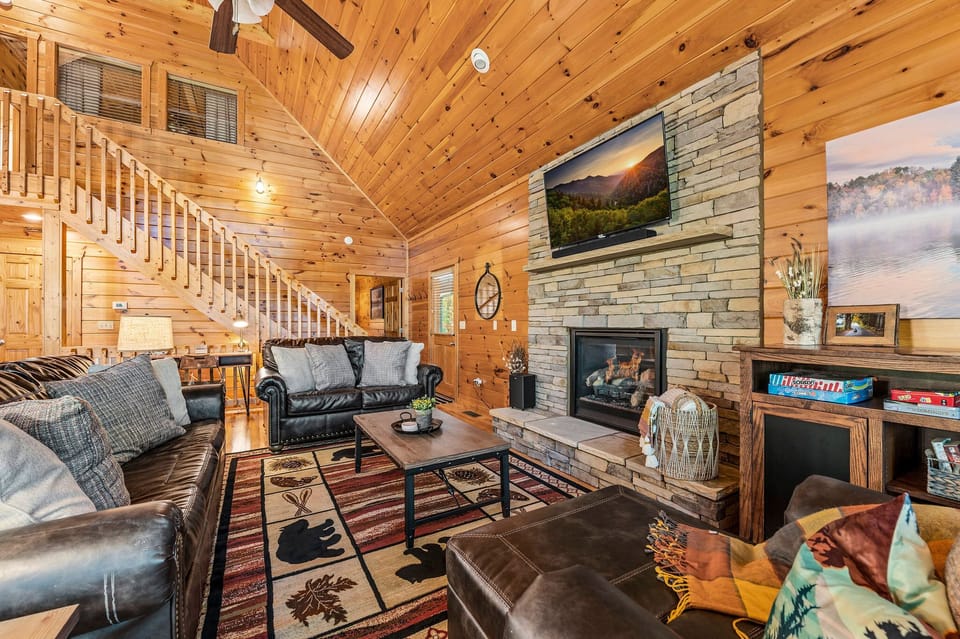 Main Floor Living Room Area with 55" High Def TV and Gas Fire Place.