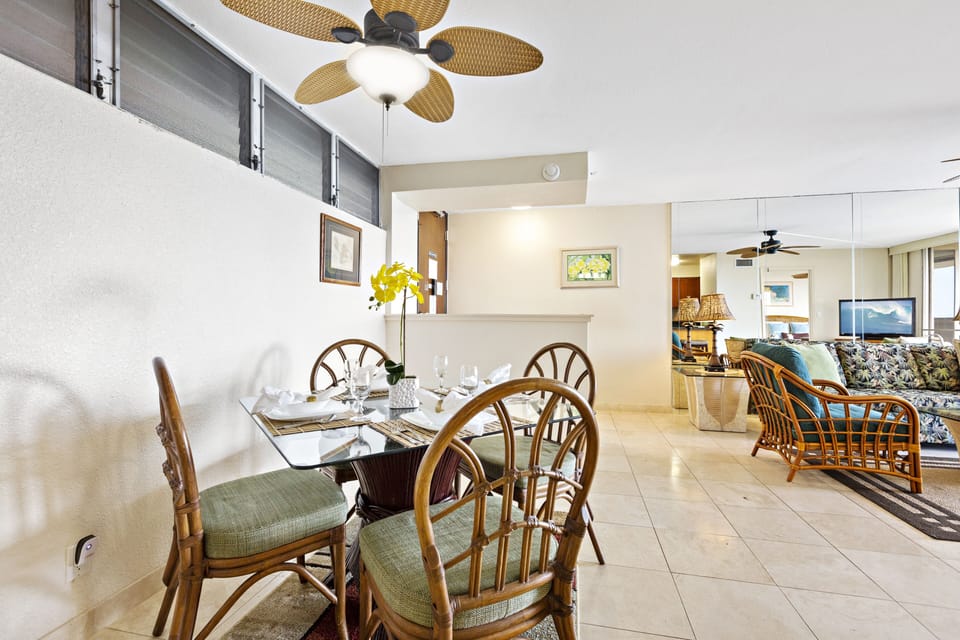 Dine al fresco on the lanai or indoors at this table for 4